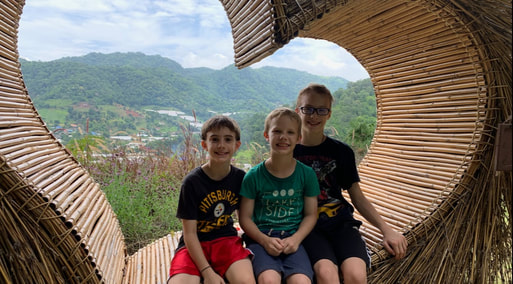 The Baker boys enjoying a mountain view