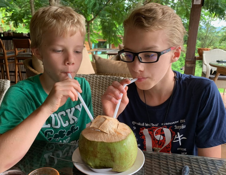 Enjoying fresh coconut water